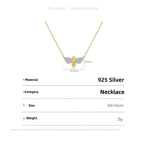Macro view of S925 silver bee pendant with dimensions 15.5mm by 8.5mm and white crystals