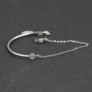 Minimalist silver chain bracelet with 18K gold C-shape steel and cubic zirconia stone