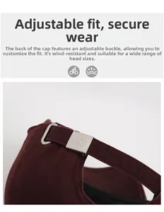 Detail of adjustable metal buckle and burgundy cotton fabric on baseball cap back