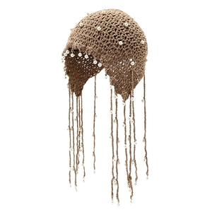 Brown knit beaded hat with white pearls and hanging fringe tassels in ethnic style