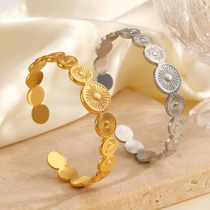 Minimalist stainless steel circular open cuff bracelets with sunburst texture in gold and silver