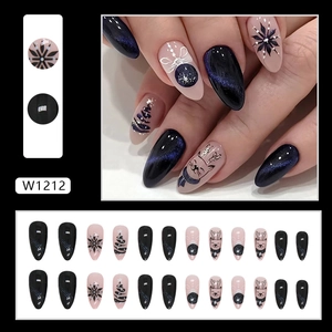 Blue cat-eye almond press-on nails with Christmas snowflake and reindeer designs