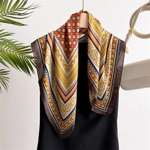 70cm vintage silk-like square scarf with geometric floral print on a hanger