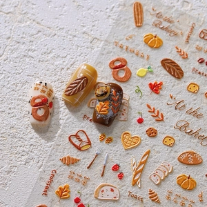 Stickers à ongles 5D embossés thème boulangerie d'automne avec croissants et citrouilles