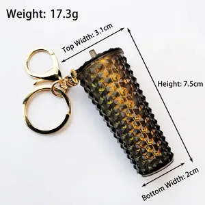 Macro view of smoky grey studded cup keychain showing 7.5cm height and size dimensions