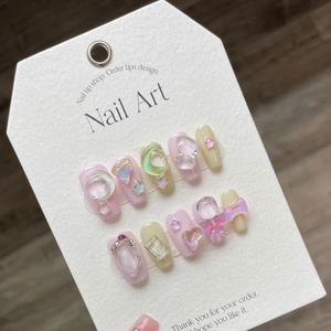 Handmade Mocha long ballerina press-on nails with 3D aurora hearts and butterfly charms
