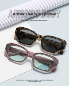 Close-up of leopard print and pink gray frames with inner temple specs and details