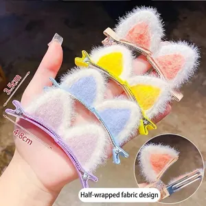 Plush cat ear hair clips for girls featuring soft fabric and safe half-wrapped clips