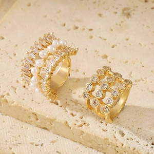 Elegant gold multi-layer ear cuff set with sparkling zircon and white pearls on stone