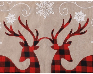 Detail of buffalo plaid deer embroidery and white snowflakes on burlap Christmas tree skirt