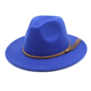 Detailed view of royal blue wool fedora hat featuring a brown woven belt with tassel