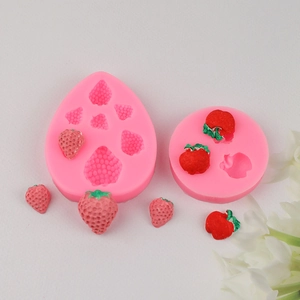 Pink silicone strawberry and fruit fondant baking molds with detailed fruit clay shapes