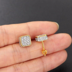Macro shot of hip-hop square zircon stud earring with secure threaded screw back detail