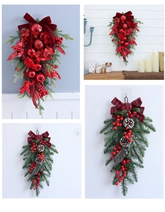 Detail of Christmas swags with pine cones, berries, and bows for festive door decoration