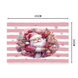 Detail showing 45x30cm pink Santa Claus Christmas placemat with clear size annotations