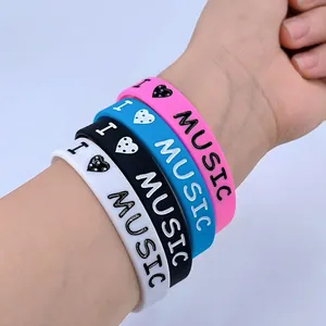 Hip-hop silicone wristbands with I Love Music print in pink, blue, black, and white