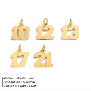 Detailed view of gold stainless steel number charms 10, 12, 13, 17, 21 for DIY jewelry