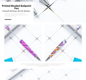 Detail of printed beadable pens featuring purple abstract and colorful geometric patterns