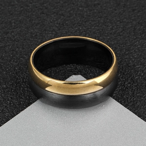 Minimalist 8mm gold and black two-tone stainless steel ring with polished finish