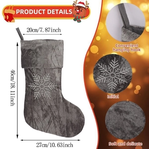 Grey plush Christmas stocking with white snowflake embroidery and dimensional sizing