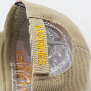 Khaki US Marines baseball cap with yellow embroidered strap and breathable cotton texture