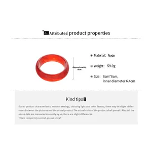 Detailed view of red resin bangle showing smooth texture and 6.4cm inner diameter