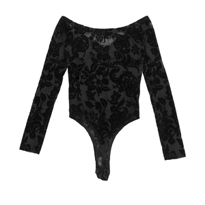 Detailed view of the sheer black floral flocking fabric on this off-shoulder bodysuit