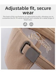 Detail of adjustable metal buckle and Warrior embroidery on khaki baseball cap