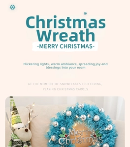 Close-up of 30cm blue Christmas wreath with silver ornaments and glowing LED lights