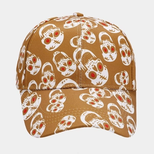 Detailed close-up of brown baseball cap featuring all-over red-eyed skull prints