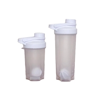White protein shaker bottles with measurements and mixing balls for gym and fitness use