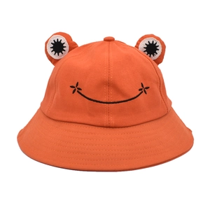 Detailed embroidery and 3D eye decorations on this vibrant orange frog bucket hat