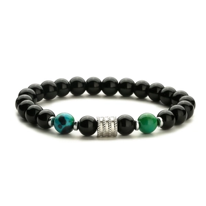Polished black obsidian bead bracelet with tiger eye accents and silver metal cylinder