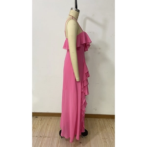 Detail view of pink chiffon maxi dress featuring layered ruffles and delicate spaghetti straps