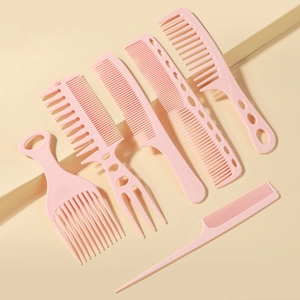 Detail view of 6-piece pink professional hair comb set for styling and detangling
