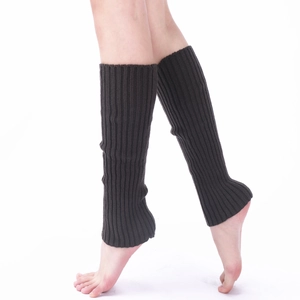 Detail view of dark grey ribbed knit leg warmers showing high elasticity and soft texture