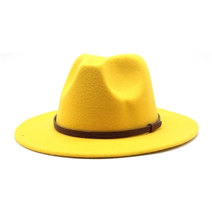 Close-up of bright yellow wool fedora hat with a contrasting brown leather decorative band