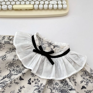 Infant girl vintage floral long sleeve top with lace ruffle collar and black bow detail
