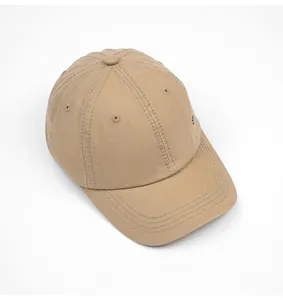 Top view of a khaki cotton baseball cap with embroidered eyelets and stitched brim