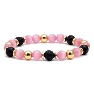 Bracciale fatto a mano con occhio di gatto rosa, pietra lavica nera e accenti dorati