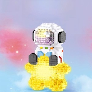 Detail of astronaut building block pen holder with 387 pieces and glowing light feature
