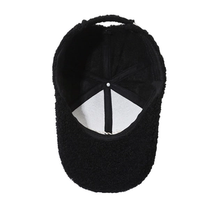 Women's black faux shearling baseball cap with warm fleece interior and adjustable strap