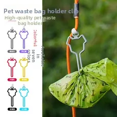 Colorful portable pet waste bag holders hanging on an orange leash in outdoor scene