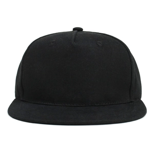 Detailed close-up of a premium black cotton twill flat-brimmed baseball hat for kids