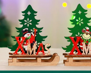 Detail view of assembled wooden XMAS sled ornament with Santa and reindeer figures