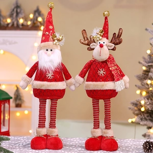 Detail of Christmas plush figurines featuring retractable legs and sequin star ornaments