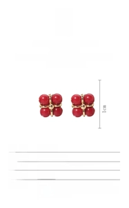 Macro view of natural red baroque pearl earrings with S925 silver 18K gold plated studs