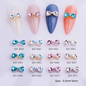 Bowknot heart nail art charms set with 12 colors shown in a professional grid display