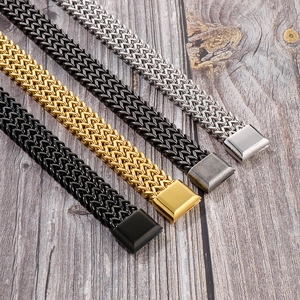 Macro detail of multi-row braided metal chain bracelets with magnetic square clasps