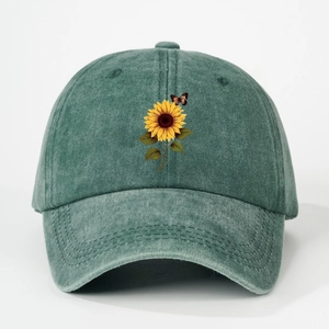 Vintage dark green baseball cap featuring embroidered sunflower and butterfly patterns